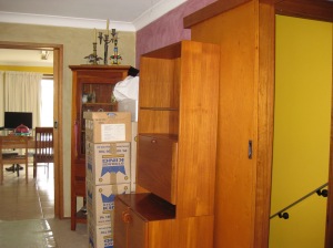 Boxes and furniture put wherever they would fit.